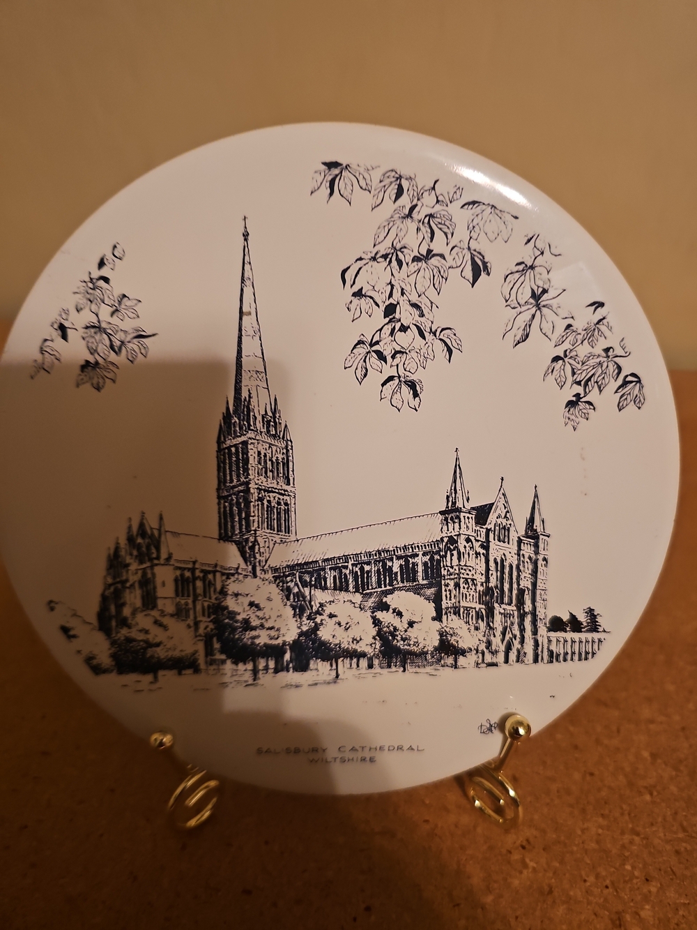 vintage 6-inch round ceramic decorative plate featuring a black and white